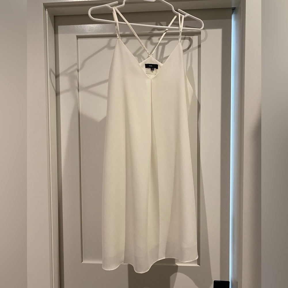 Fate. White short dress. Skinny straps.